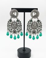 Ethnic green stone goddess motif jhumka earrings