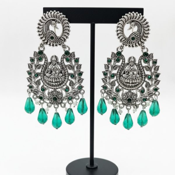 Ethnic green stone goddess motif jhumka earrings