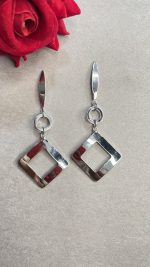 Sleek silver tone drop earrings - Image 2