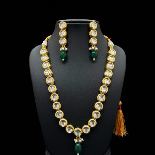 Gold plated polki look and emerald drop necklace and earrings