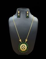 Emerald green lotus meenakari gold tone set