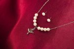 Pearl and Figural Pendant Set