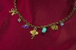 Elephant and mixed-charm gold chain